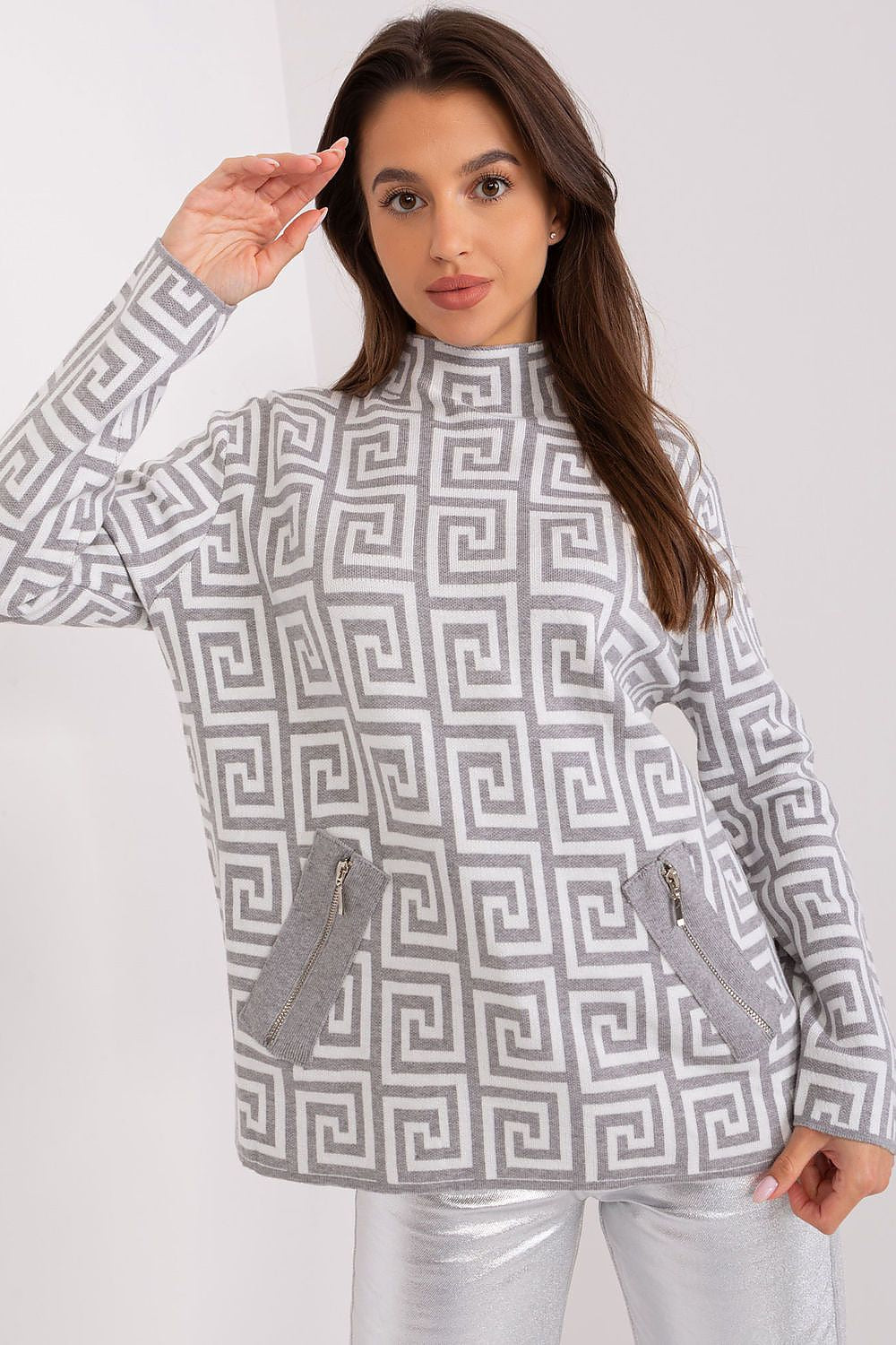 AT's exquisite long sleeve half turtleneck women's sweater with a trendy geometric print and convenient zippered pockets, perfect for any chic wardrobe.