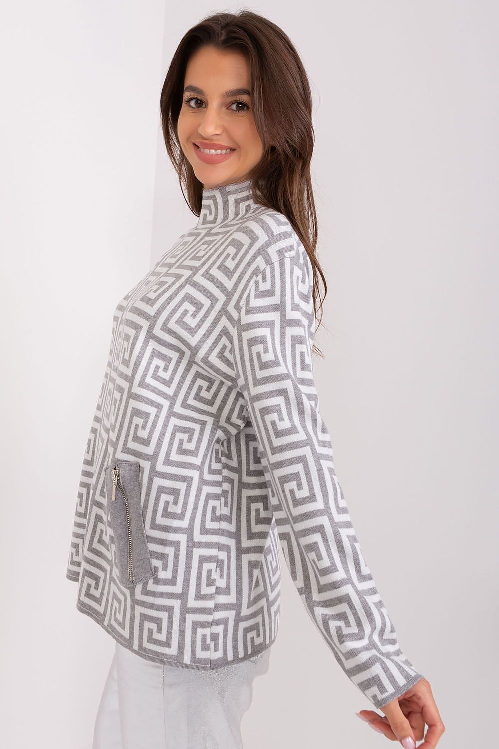 Stylish women's sweater featuring a geometric pattern and half turtleneck design by AT, incorporating elegant zippered pockets for added convenience.