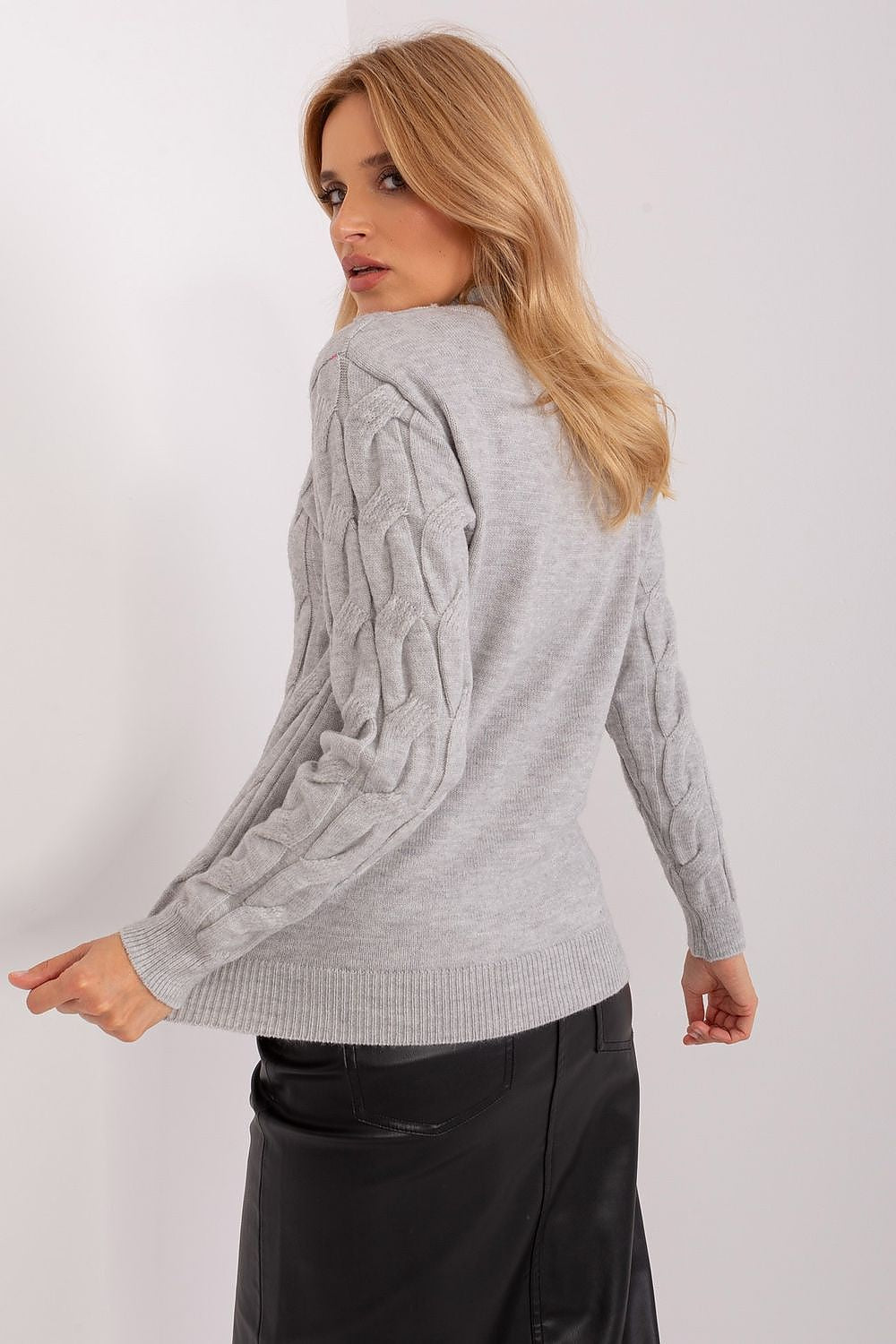 Elegant Women's Half Turtleneck Sweater by AT displayed on a model, showcasing its luxurious textured cotton blend in a chic casual style.