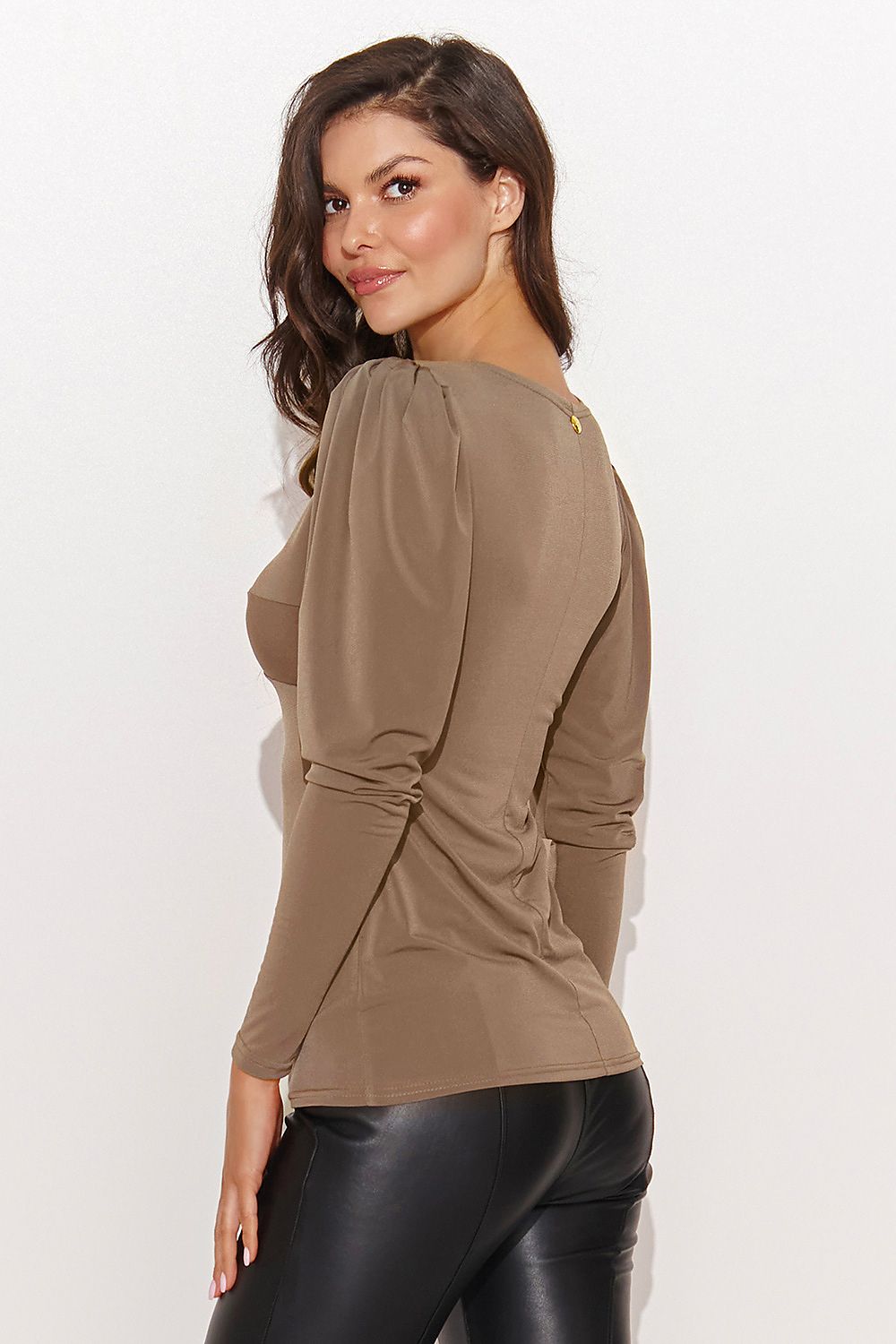 Elegant Numinou women's blouse in V-neck style with romantic buff sleeves, perfect for stylish outfits.