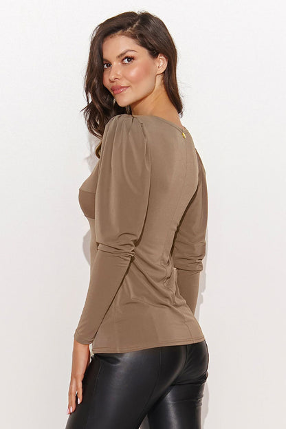 Elegant Numinou women's blouse in V-neck style with romantic buff sleeves, perfect for stylish outfits.