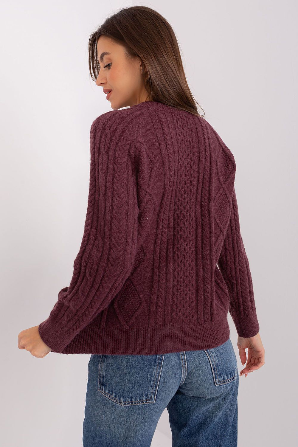 Showcasing the fashionable round neckline and button details of the women's cardigan sweater by AT, a must-have for sophisticated casual style.