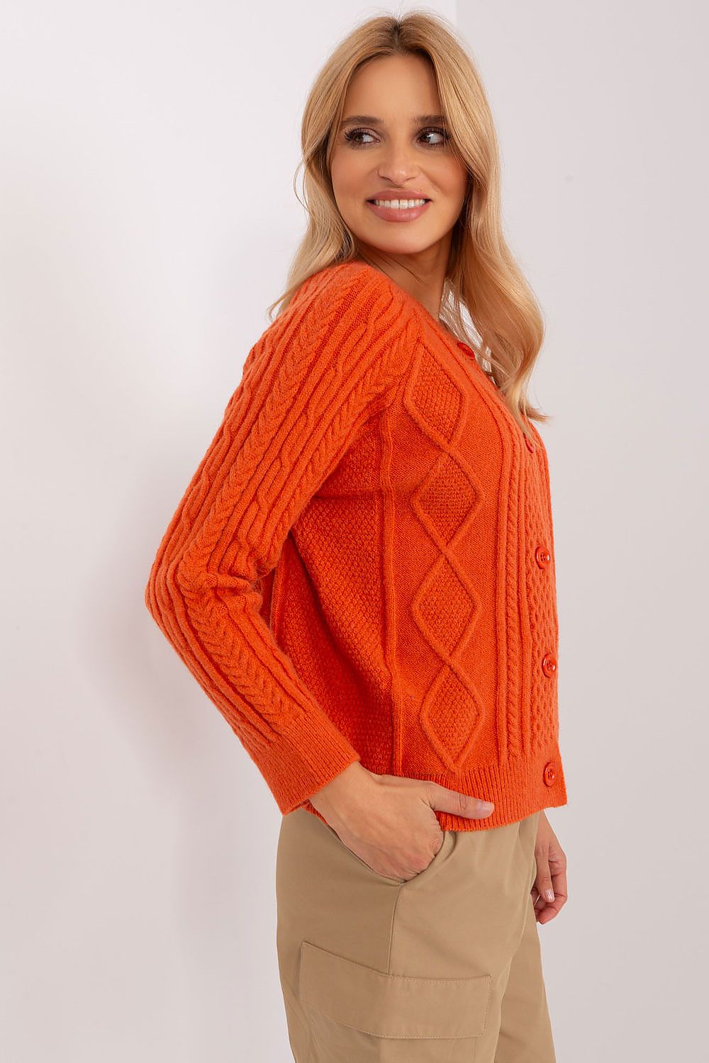 Luxurious women's cardigan sweater by AT, showcasing unique variegated fabric and stylish button details.