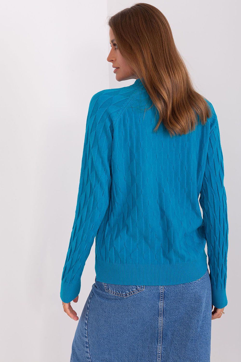 Stylish long-sleeve women's sweater by AT, showcasing a unique variegated texture and providing comfort for colder days.