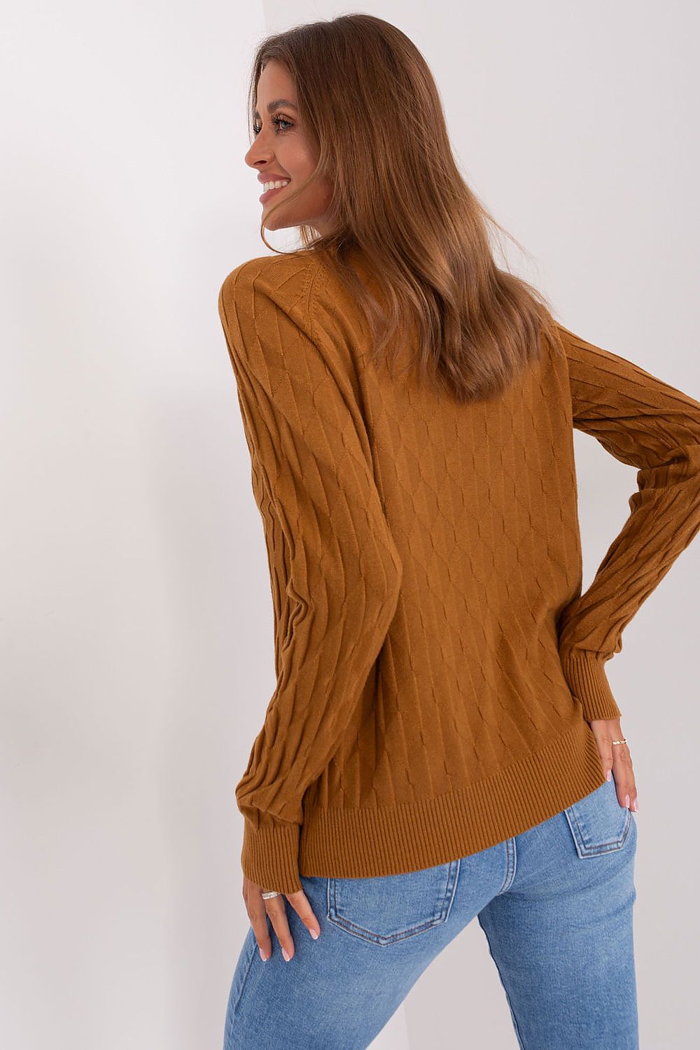 Elegant women's variegated sweater with round neckline by AT, showcasing a stylish and unique texture perfect for casual wear.