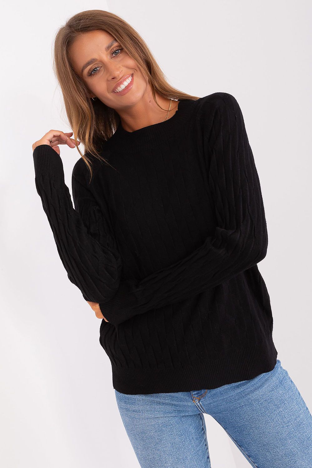 Close-up of AT's luxurious women's sweater, featuring variegated fabric and a classic round neckline for a sophisticated yet comfortable look.