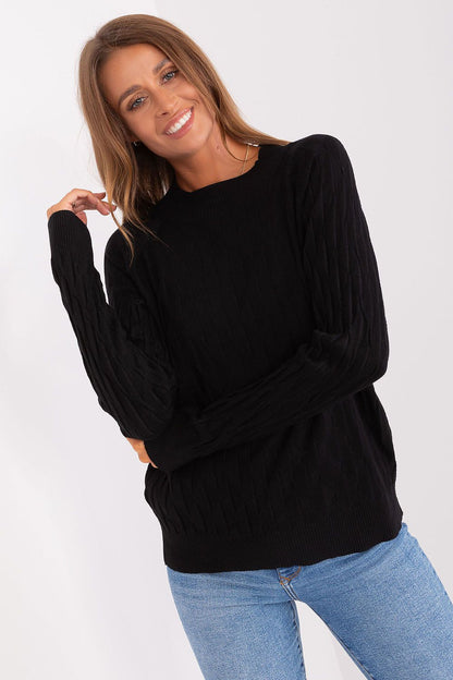 Close-up of AT's luxurious women's sweater, featuring variegated fabric and a classic round neckline for a sophisticated yet comfortable look.