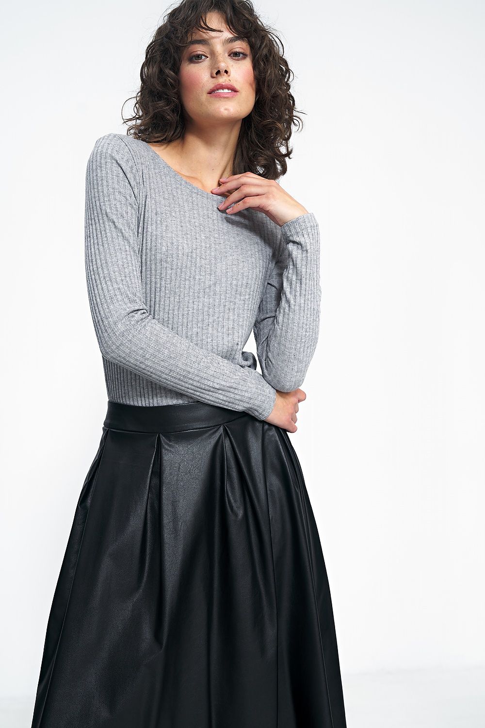 Detailed view of Nife Classic Blouse features, showcasing its refined design for stylish office attire.