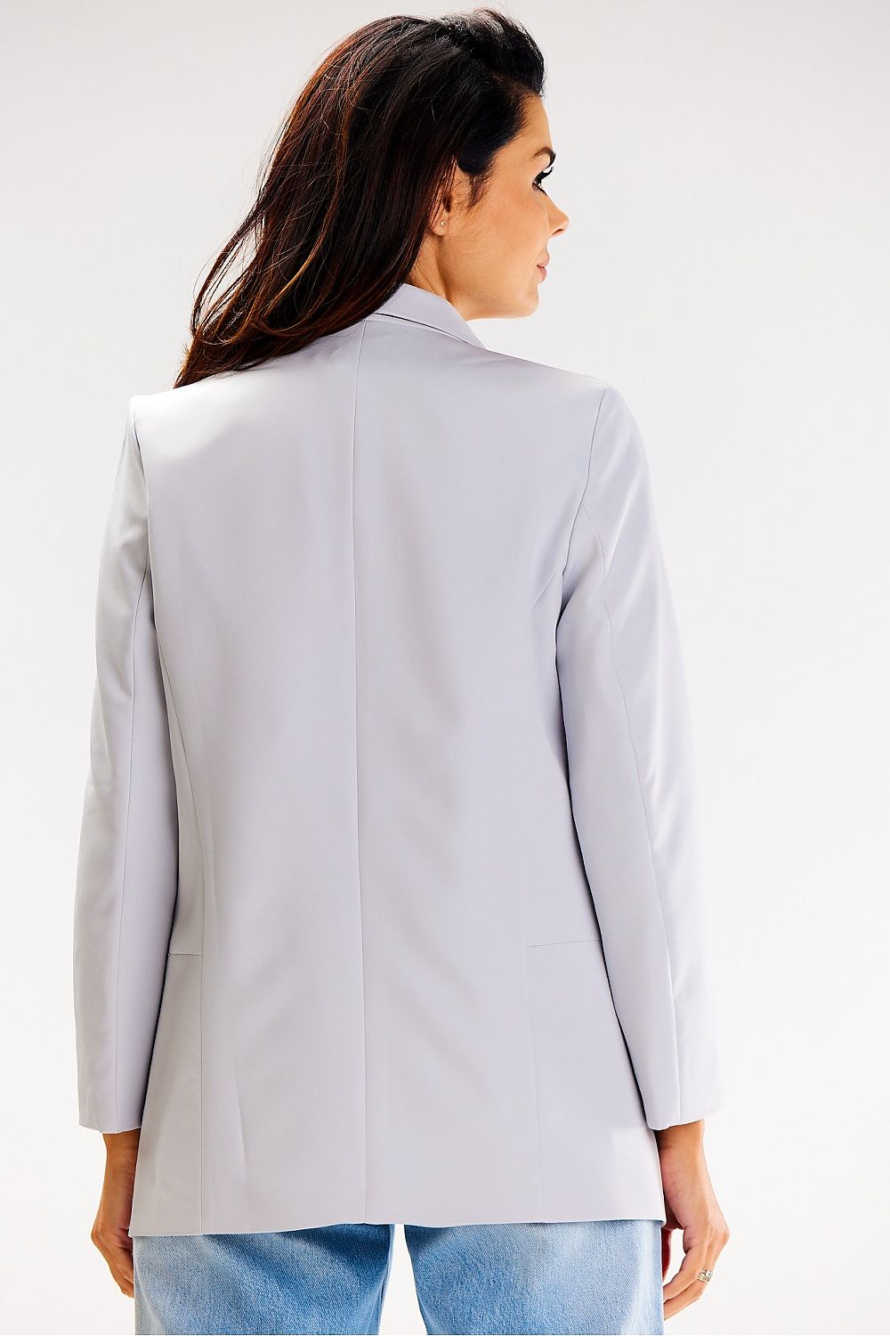 Close-up of Awama jacket's intricate ruffled sleeves and premium fabric, exuding luxury and comfort.