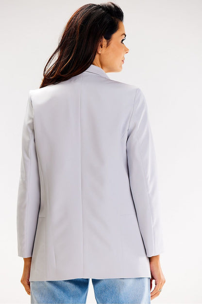 Close-up of Awama jacket's intricate ruffled sleeves and premium fabric, exuding luxury and comfort.