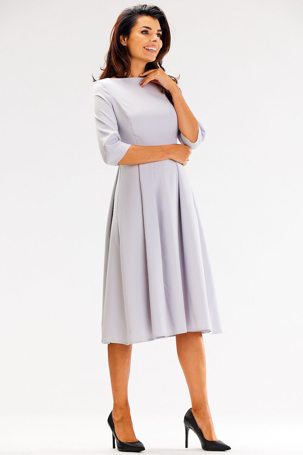 Elegant flared daydress by Awama featuring 3/4 sleeves and a sophisticated boat neckline, perfect for upscale occasions.