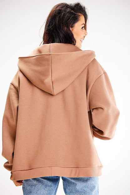 Elegant Awama loose fit sweatshirt with a zippered front, designed with a stylish hood and practical pockets.