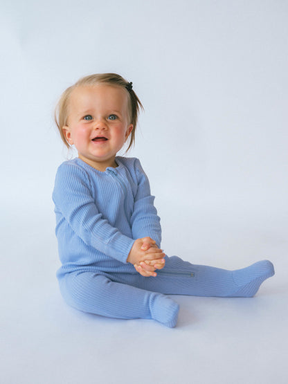 Elegant Powder Blue Zip Sleepsuit for infants by DreamBuy, ideal for sensitive skin, versatile for play and sleep, a chic choice for baby fashion.