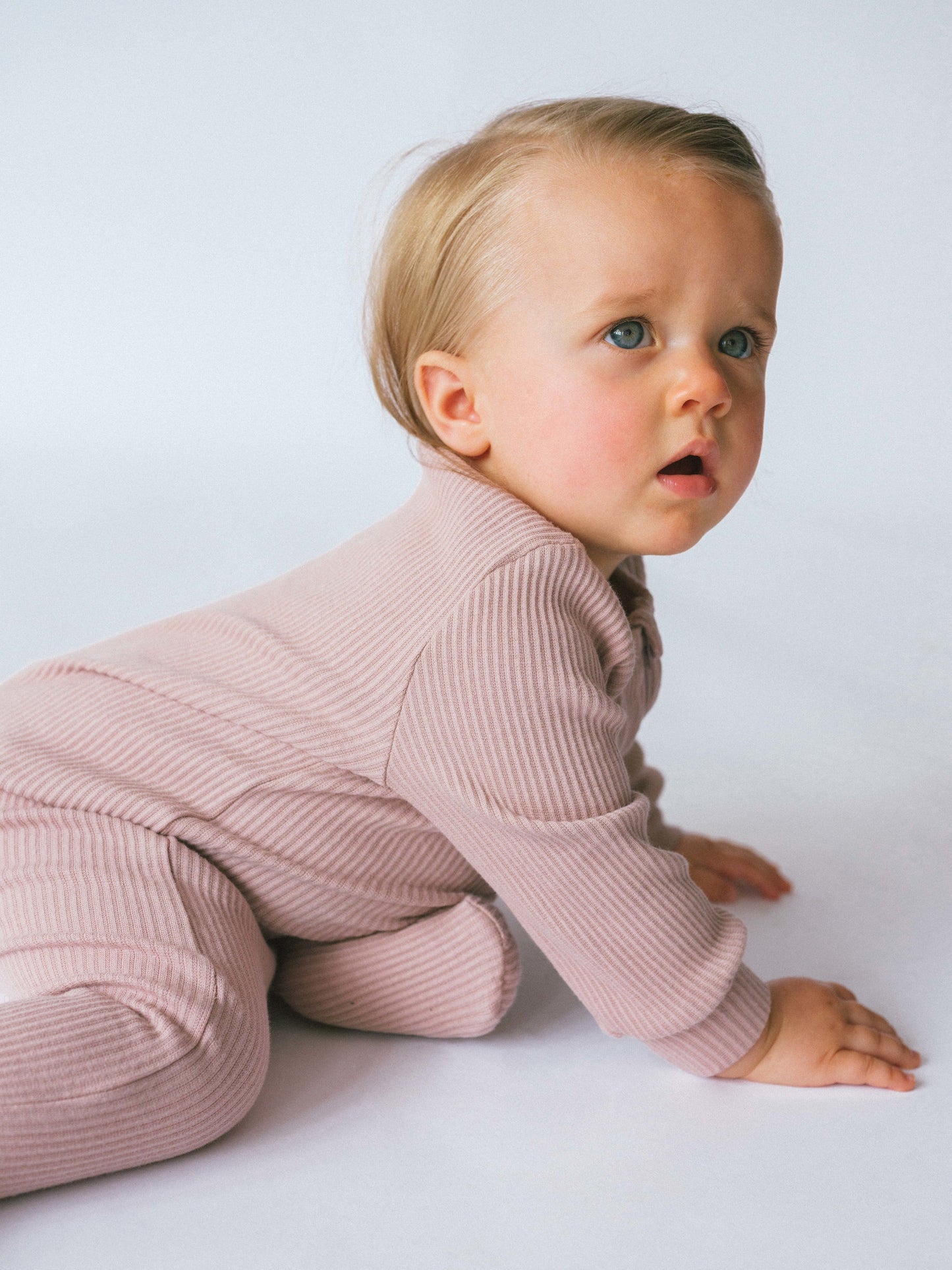 Luxury Velvet Mocha Zip Sleepsuit for Babies by DreamBuy, designed for ages 0-3 years, featuring a soft skin-friendly texture for ultimate comfort.