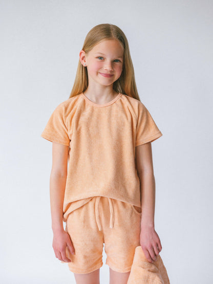 Personalised 3-piece towelling cotton sunset summer set for kids by DreamBuy, featuring a stylish beach outfit including a breezy top, comfy pants, and a fashionable bucket hat, perfect for outdoor adventures.