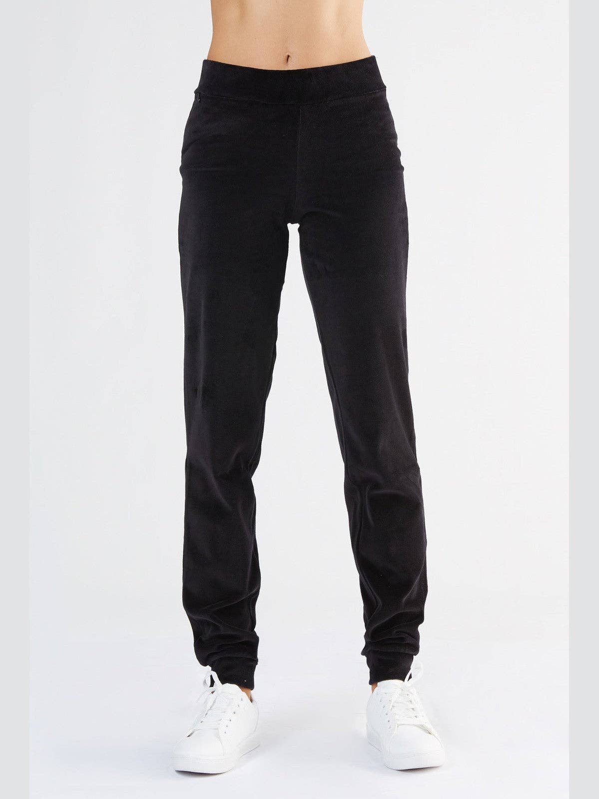 Chic women's organic cotton tapered leg sweatpants with cuffed ankles, exuding a modern sporty vibe perfect for any casual occasion.