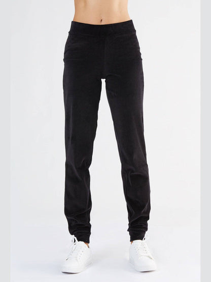 Chic women's organic cotton tapered leg sweatpants with cuffed ankles, exuding a modern sporty vibe perfect for any casual occasion.