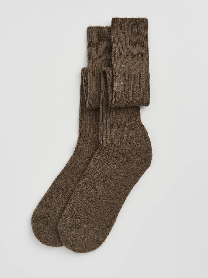 Premium quality knee high socks made from wool, featuring a cushioned sole for all-day comfort.