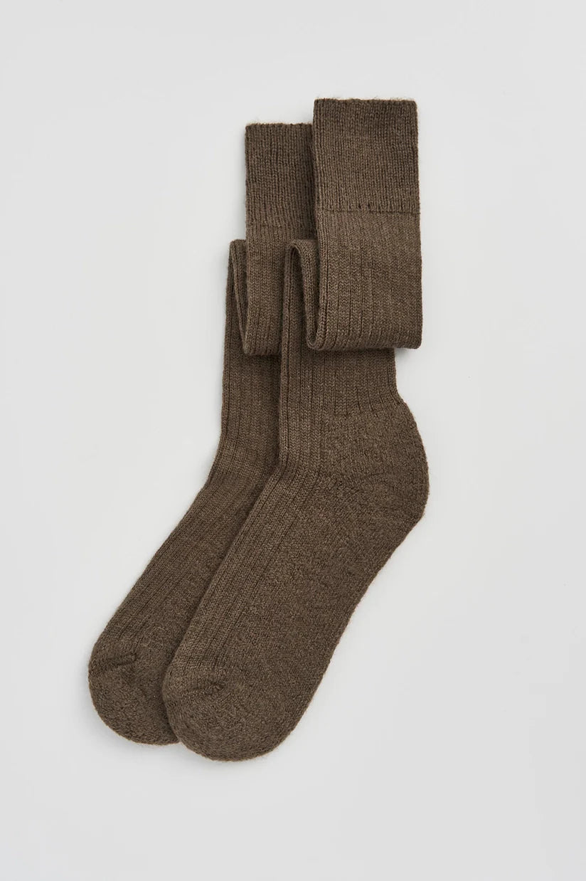 Luxury wool knee high socks with cushioned sole, showcasing warmth and comfort, expertly crafted in Portugal.