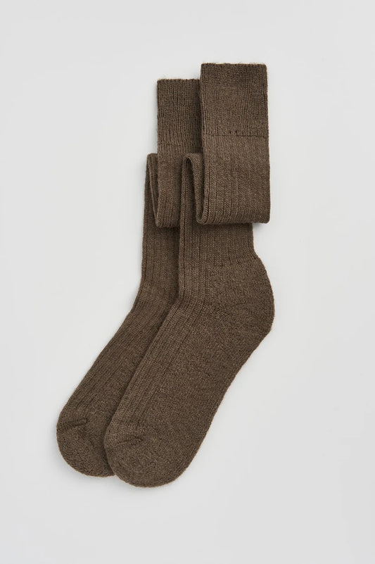 Luxury wool knee high socks with cushioned sole, showcasing warmth and comfort, expertly crafted in Portugal.