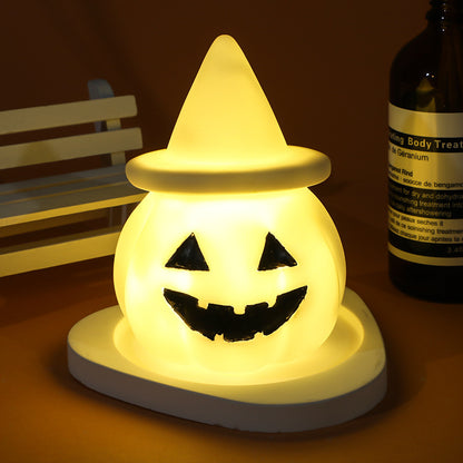 Halloween LED Glowing Cute Small Night Lamp featuring a charming pumpkin design, radiating a warm, inviting glow, perfect for elegant Halloween decor.