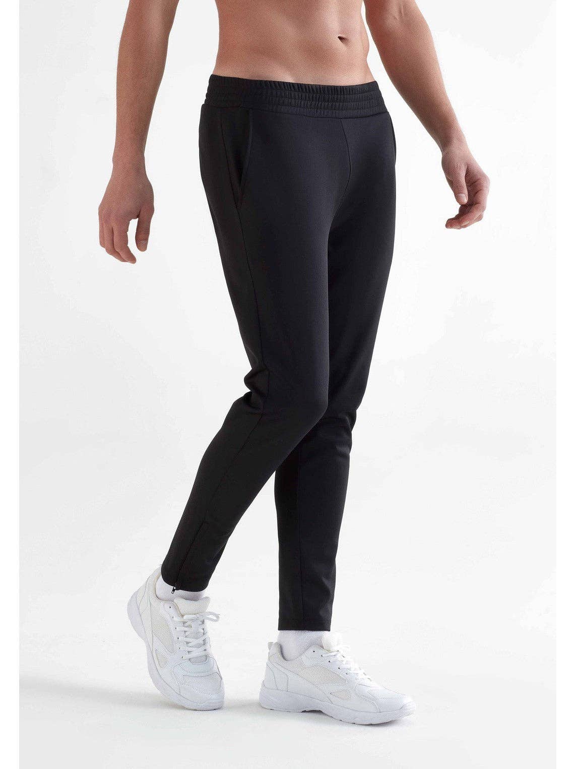 Luxurious Eco-Friendly Men's Recycled Sports Sweatpants featuring tapered legs and an elastic waistband, crafted from 100% recycled polyester for optimal comfort and style.