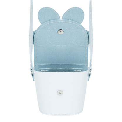 Personalised option of the Luxury Handmade Leather Daisy Barrel Bag featuring a leather tab for unique engraving.