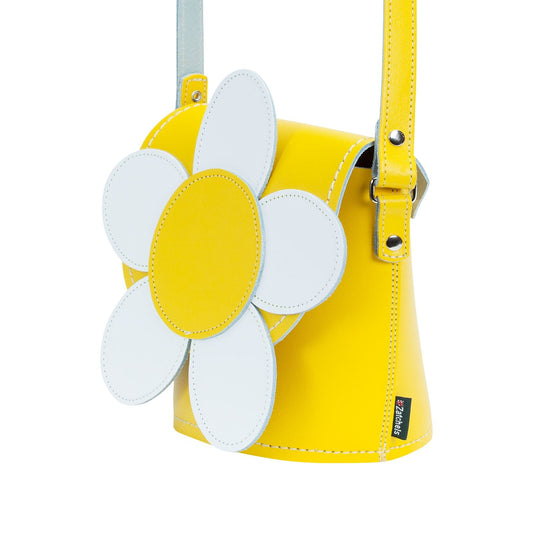 Elegant Pastel Yellow Handmade Leather Daisy Barrel Bag featuring a unique floral design and fine craftsmanship, perfect for stylish outings.