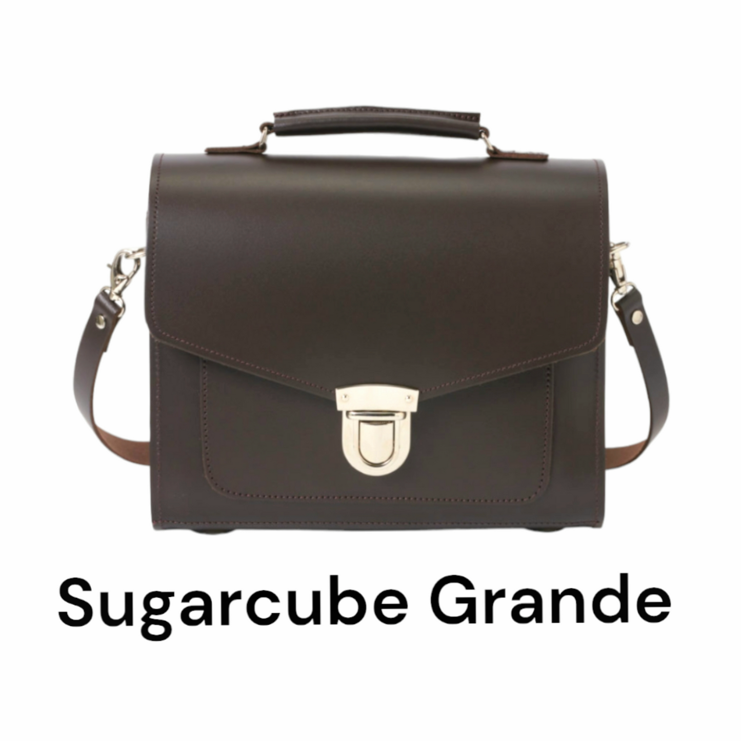 Dark Brown Sugarcube Handbag in Grande size styled with an adjustable strap, demonstrating its functionality and fashionable appeal.