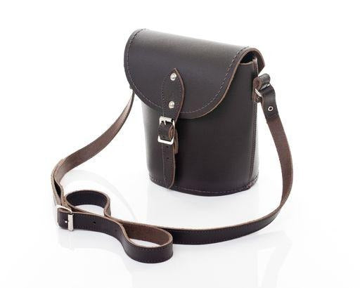 Elegant dark brown leather barrel bag from Zatchels, featuring premium quality leather and stylish silver nickel buckle.