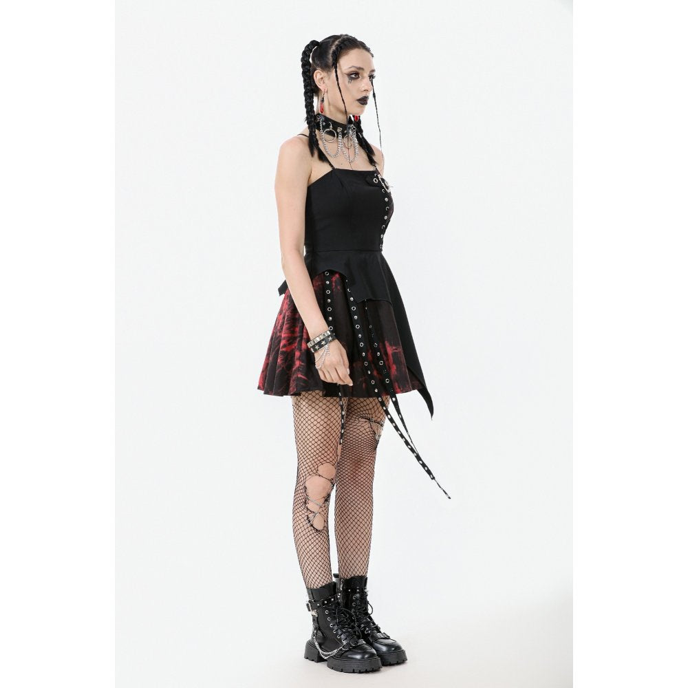 Model displaying the Dark in Love Nyssa Black and Red Goth Mini Dress styled with fishnet tights and chunky boots for a bold night-out look.