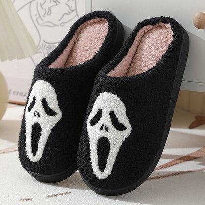 Luxurious Halloween Skull Cartoon Print Slippers featuring a striking black design with playful skull motifs, perfect for men and women during winter.