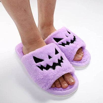 Halloween Shoes Winter Cute Warm Home Slippers Women - Plush purple slippers featuring a playful pumpkin face design, perfect for a cosy Halloween evening.