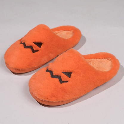 Cute Halloween Pumpkin Slippers Winter Warm Plush Bedroom Floor Home Slippers Casual Slip On Comfortable Cozy Indoor House Shoes depicted in a plush orange material with charming pumpkin expressions.