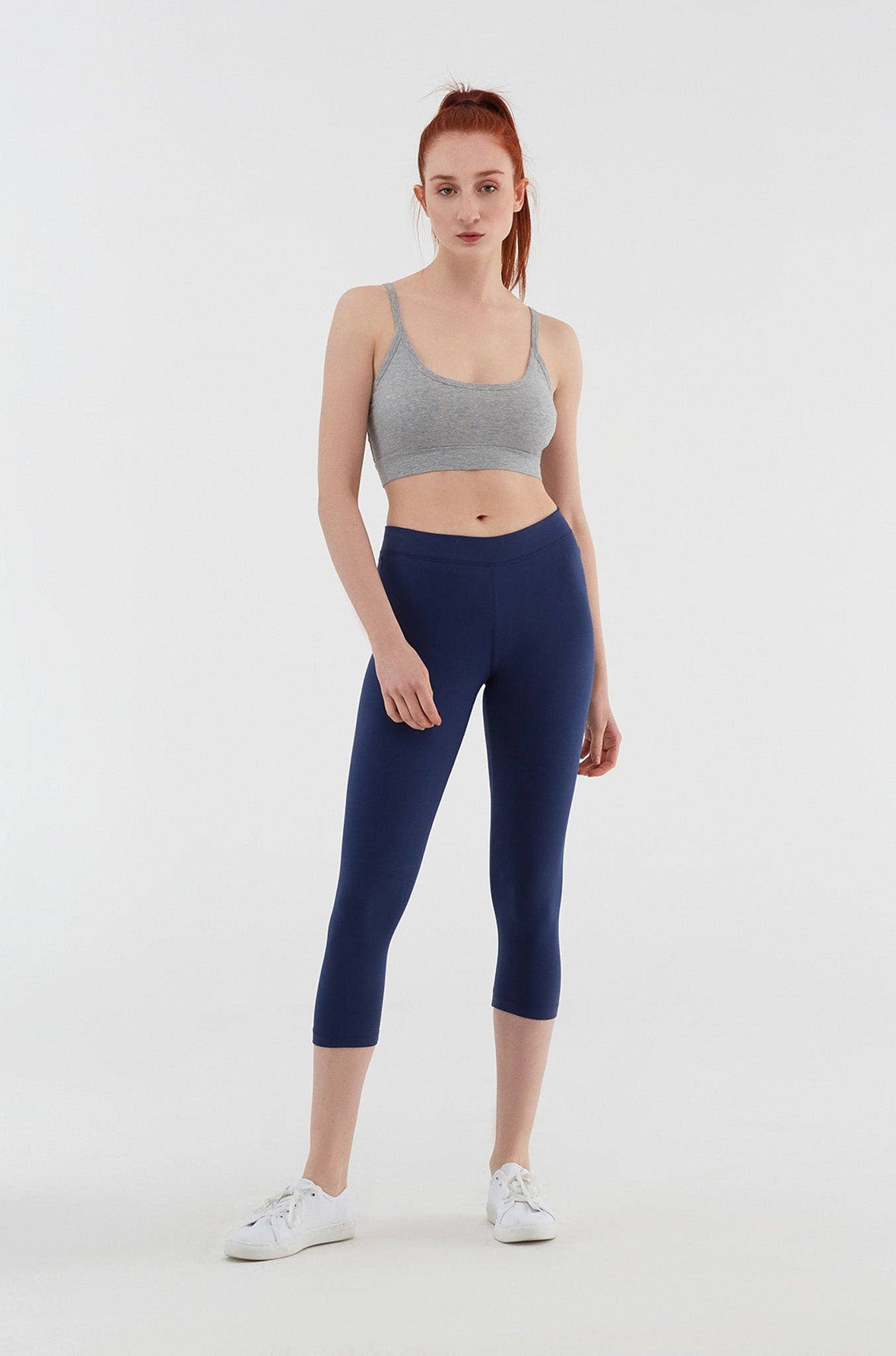 Model wearing luxury organic stretch leggings, elegantly demonstrating the comfortable and stylish design suitable for casual or active wear.