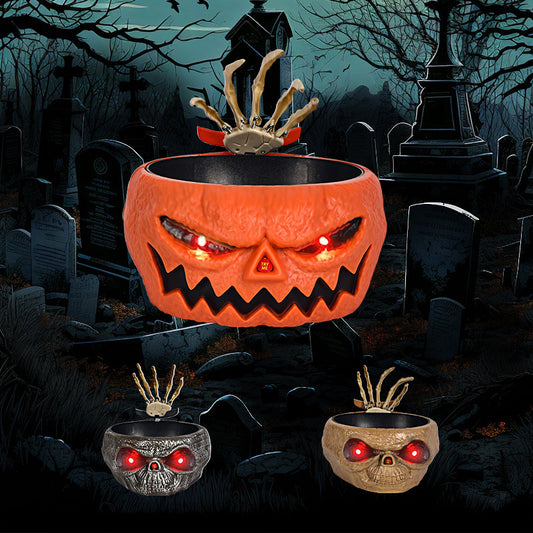 Halloween Candy Bowl With Motion Activated Skeleton Hand featuring an ominous pumpkin design and light-up eyes, perfect for spooky gatherings.