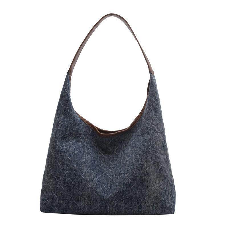 Light blue luxury denim handbag, designed for effortless style, ideal for everyday use and special occasions.
