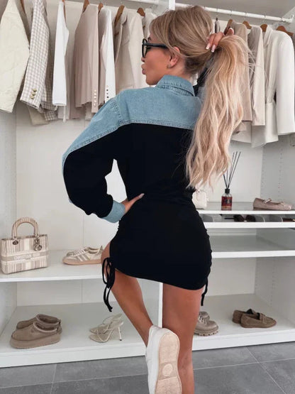 Close-up detail of the denim collar and metal buttons on a luxury denim dress, highlighting chic design elements.