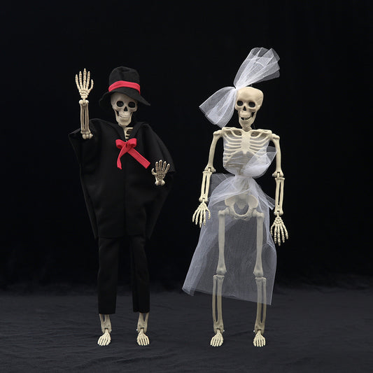 Elegant Halloween Skull Fish-skeleton Hanger showcasing two articulated skeletons in stylish attire, ideal for sophisticated Halloween decorations.