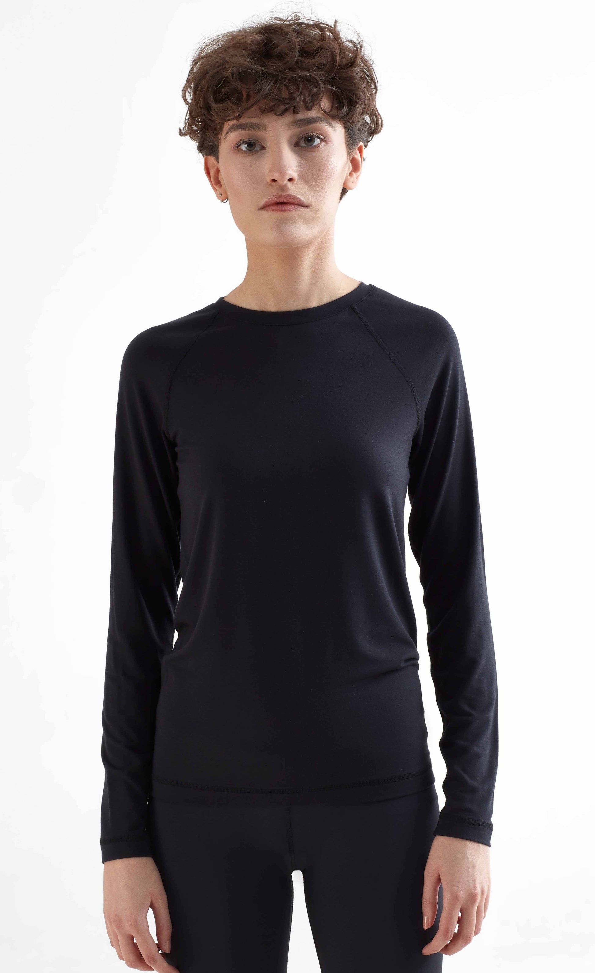 Elegantly designed Women's Slim Fit Tencel Long Sleeve Shirt featuring luxurious raglan sleeves, crafted from a soft and moisture-regulating micromodal blend for ultimate comfort and style.