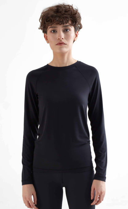 Elegantly designed Women's Slim Fit Tencel Long Sleeve Shirt featuring luxurious raglan sleeves, crafted from a soft and moisture-regulating micromodal blend for ultimate comfort and style.