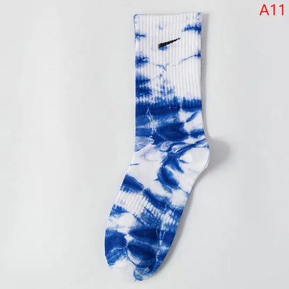 Luxurious Women's Tie-Dye Middle Tube Socks featuring a striking blue and white colour blend, perfect for vibrant comfort and all-day style.