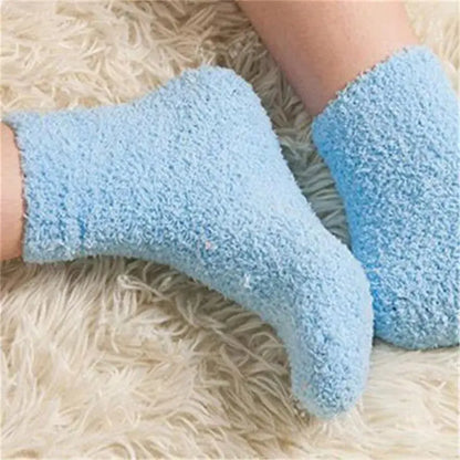 Delightful Women's Bed Socks Pure Color Fluffy Warm Winter Christmas in soothing blue, offering unmatched comfort and elegance for your feet.