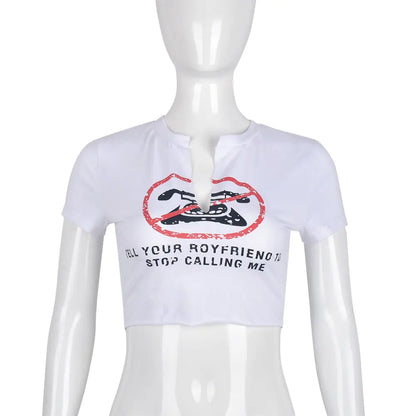 Close-up of the Tell Your Boyfriend to Stop Calling Me Slogan Print White Graphic Crop Top displayed on a mannequin, highlighting the unique slogan design and sophisticated style.