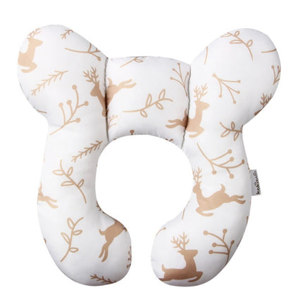 U-Shaped Infant Pillow by Dazzling Dreams Studio with a tasteful reindeer motif on a white background, combining luxury and practicality for your baby's sleep.