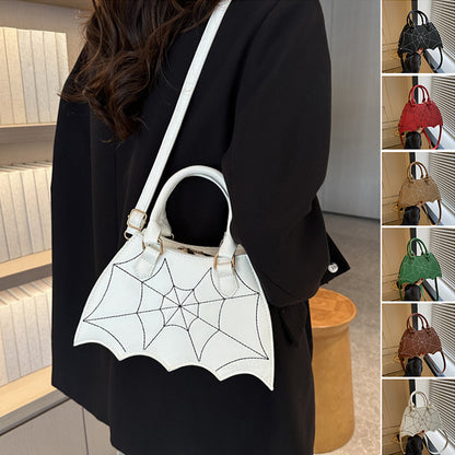Elegant Halloween Spider Web Saddle Bag showcased in white, emphasizing trendy design and festive allure, perfect for stylish women. Crossbody shoulder bag enhances your Halloween outfit with unique personality, from Dazzling Dreams Studio.