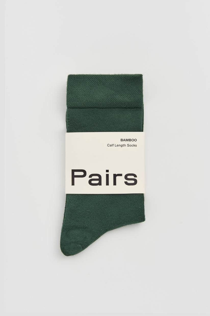 Elegant presentation of Earth Wardrobe's bamboo calf-length socks, highlighting the luxurious feel and breathable fabric.