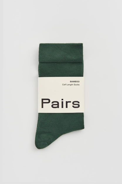 Elegant presentation of Earth Wardrobe's bamboo calf-length socks, highlighting the luxurious feel and breathable fabric.