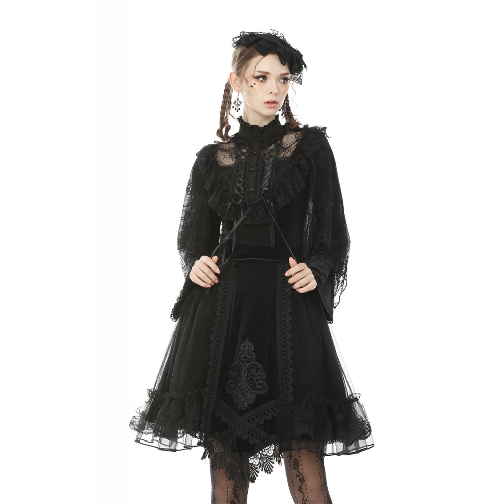 Model styling the Melisandre Gothic skirt with a dark romantic outfit, capturing the essence of luxury and vintage goth fashion.