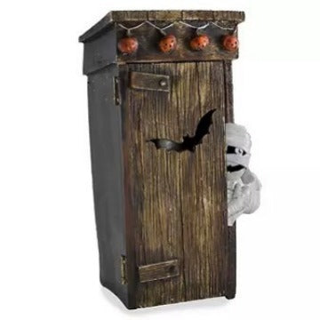 Spooky Outdoor Toilet Mummy Decoration - Creative plastic ornament featuring a mummy peeking out from a wooden toilet, adorned with pumpkin decorations and a bat silhouette.